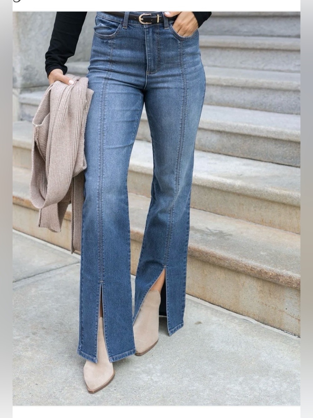 Medium wash front slit jeans. Size 0. NWOT.